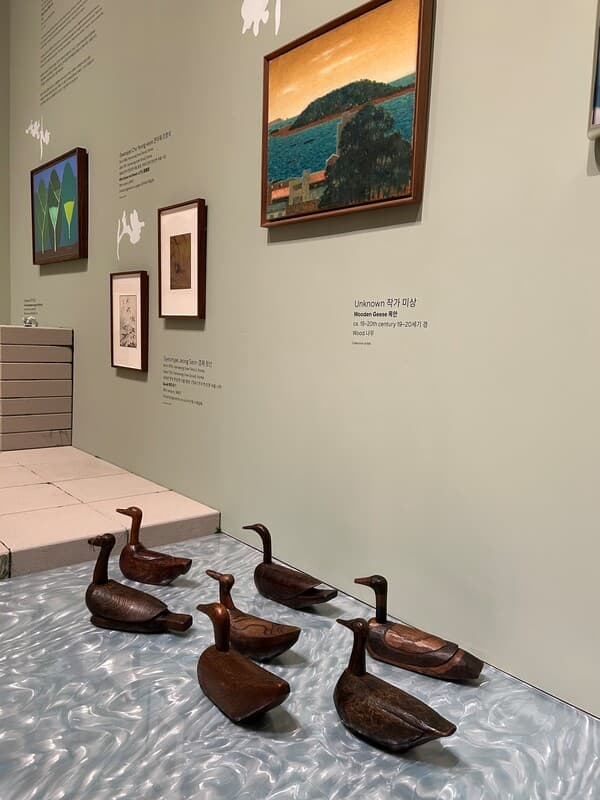 Like humans, Kim Namjoon explains, these wooden ducks from the Joseon Dynasty (often given as presents to couples when they marry) each look different.